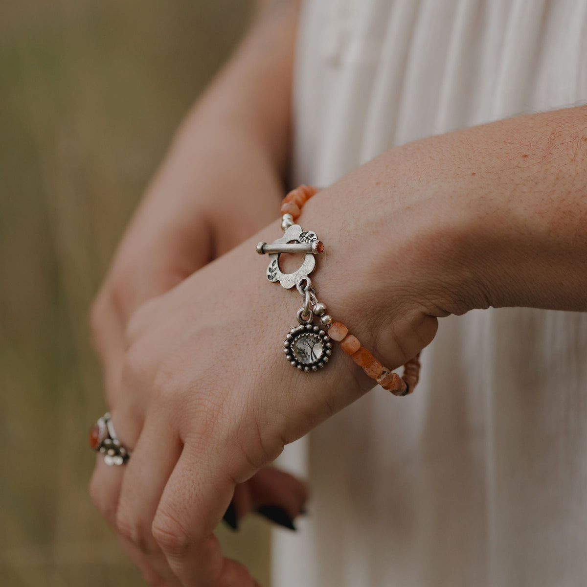 Sunstone Gemstone Bracelet with Sterling Silver Botanical Charm