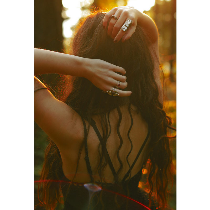 Triple Moon Goddess Ring with a Moonstone Moon phases stylized photo on a model