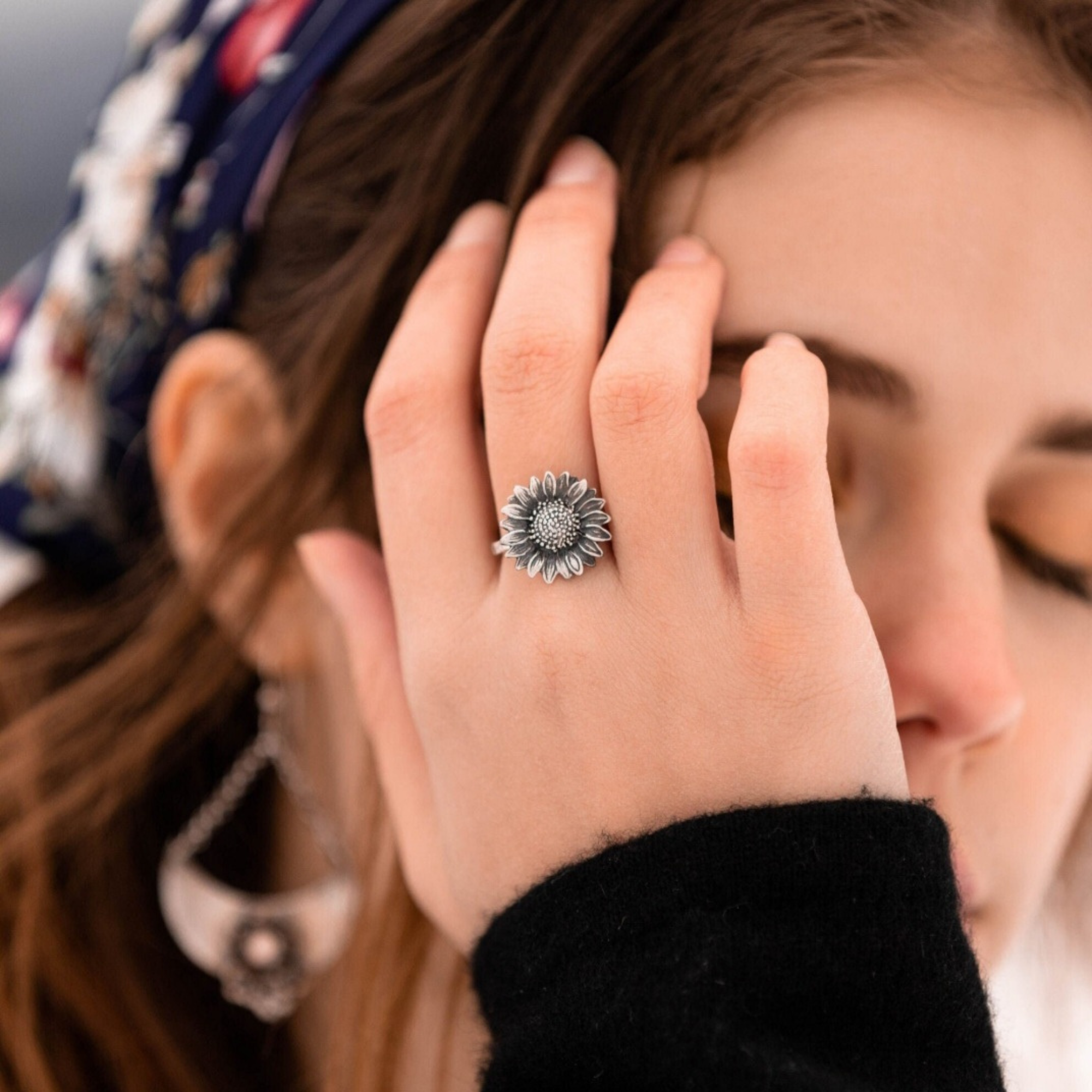 Sterling Silver sunflower ring photographed on a model