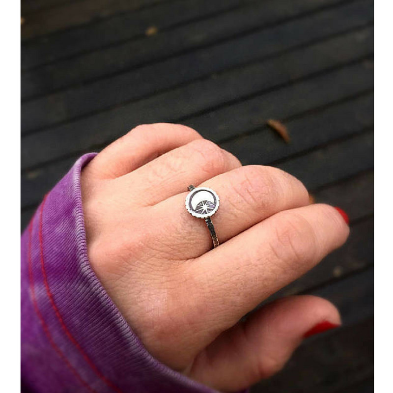 Moon and Star Celestial Ring photographed on middle finger 