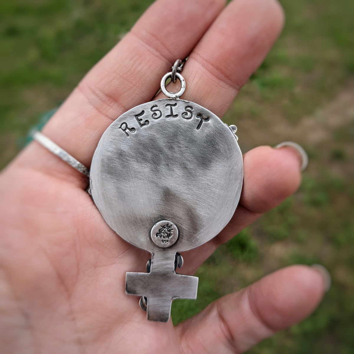 Feminist Fist Necklace with Garnet and Flowers