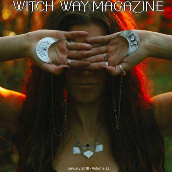 Triple Moon Goddess Necklace with Moonstone photographed on a model who is holding two of these necklaces in her palm above her eyes published on the cover of Witch Way Magazine Winter 2018 issue