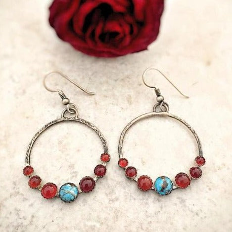 Turquoise Carnelian Gypsy Hoop Earrings laid flat view from top with a red rose behind it 